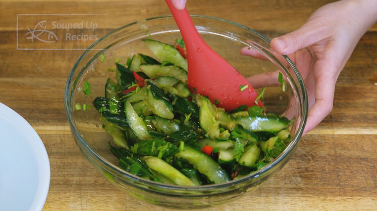 Image of Toss the cucumber with the dressing thoroughly. Before serving, top...