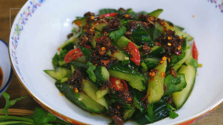 Image of Some of you may ask, why don't we mix the Lao Gan Ma into the dressing? Well, if mixed well, the cucumber juice will blend Lao Gan Ma's unique flavor into a flat taste. By topping the salad with chili...