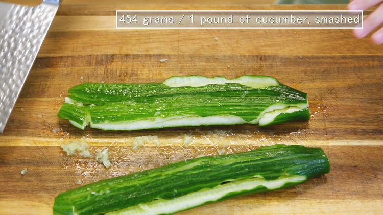 Image of Smack the cucumber until it splits along the length, creating...