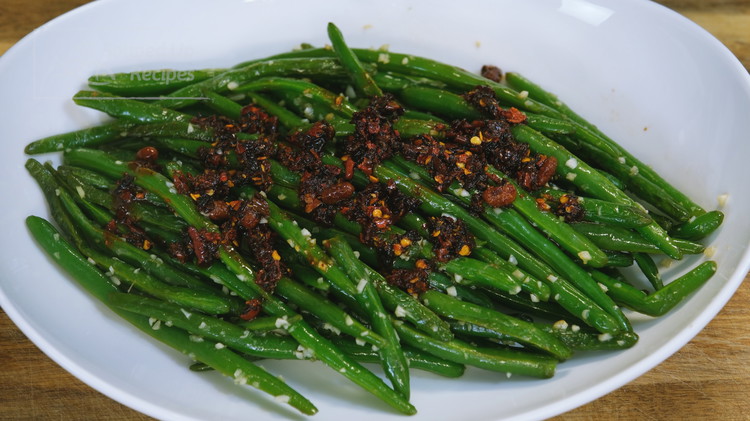 Image of Before serving, top with 2 Tbsp of Lao Gan Ma chili crisp and enjoy! Not: Every time you use Lao Gan Ma, stir it well because it is an oil-based sauce. All the salt crystals won't dissolve and will sink...