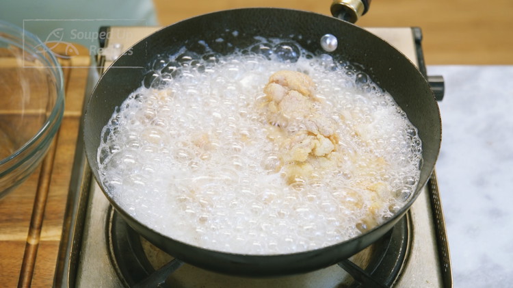 Image of Heat 1.5 cups of oil in a wok to 360 F (182 C). Fry the chicken over medium heat for about 3 minutes. Make sure you stir constantly to ensure even cooking. Take the chicken out and let it sit...