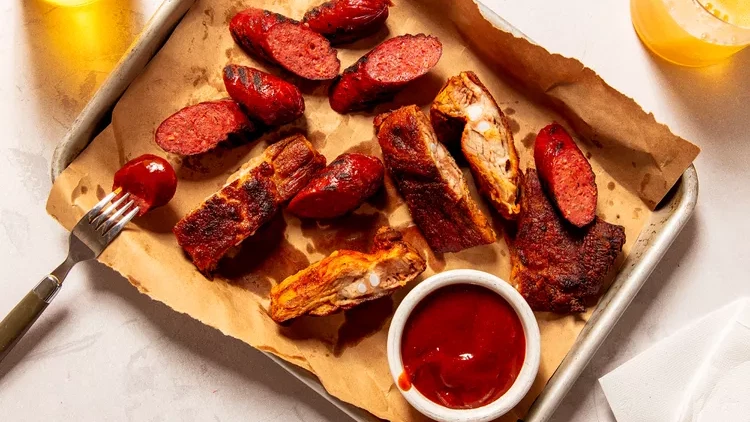 Image of Smoked Rib Tips with Andouille Sausage and Spicy Betty BBQ Sauce