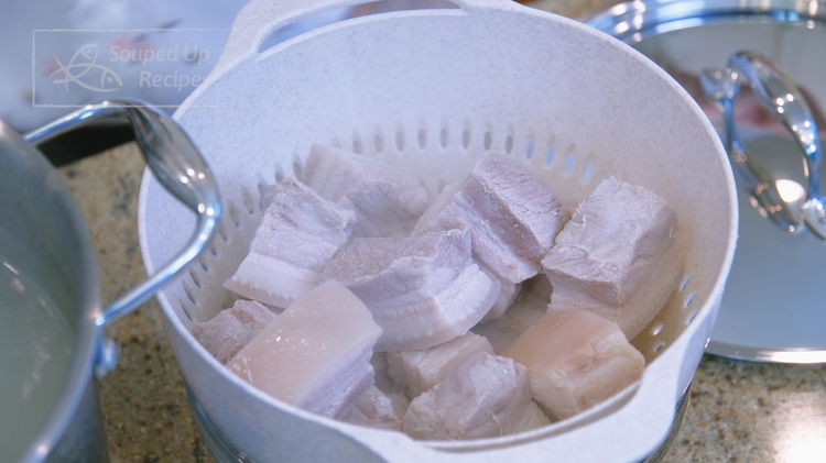 Image of Use a fine sieve to remove the foamy scum floating...