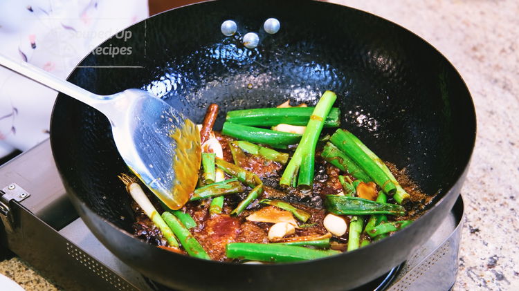 Image of Wait until the caramelized sugar starts producing foamy bubbles, and...