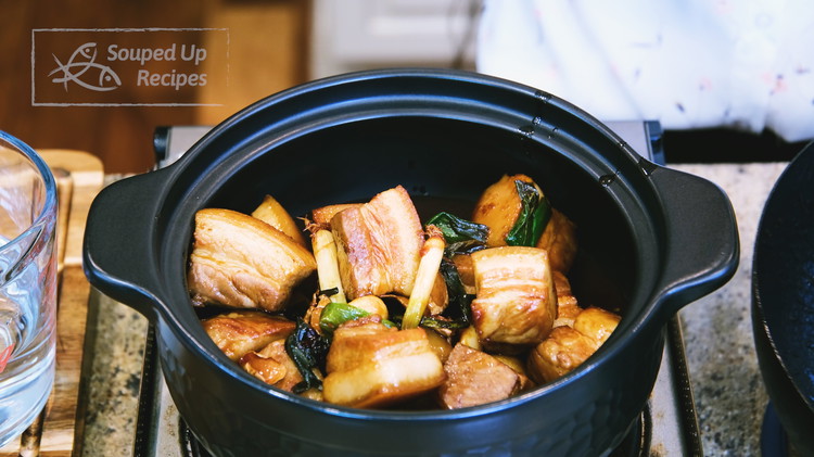 Image of Transfer everything into a clay pot. If you don't have a clay pot, use a heavy-duty stock pot or a Dutch oven.