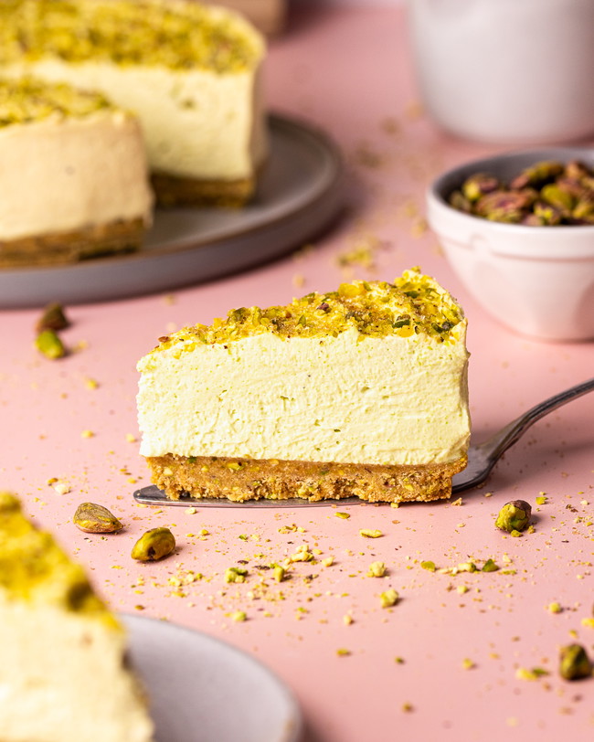 A slice of gorgeously light and fluffy pistachio cheesecake