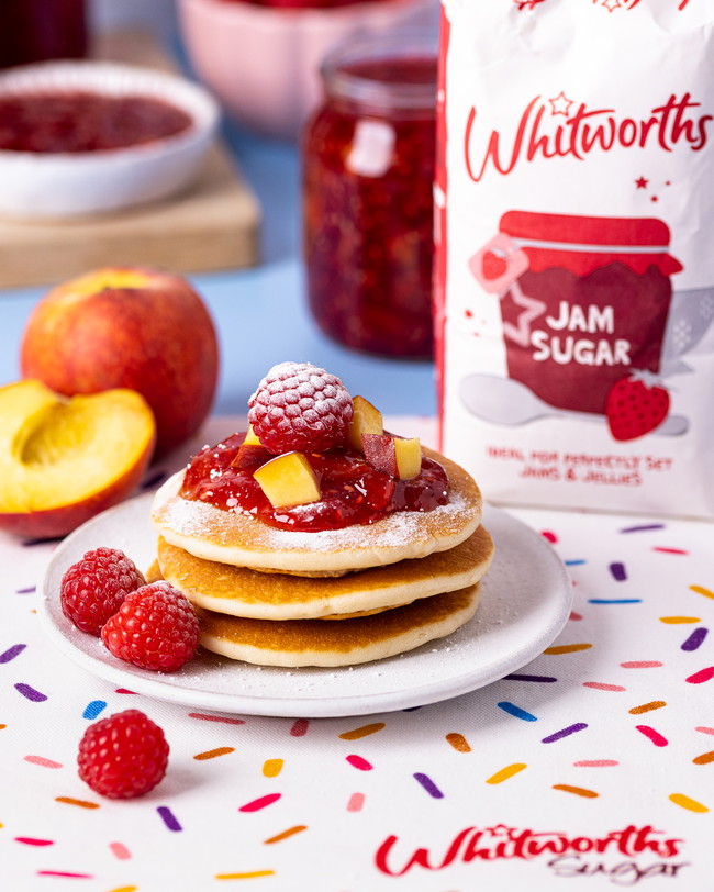 Peach & Raspberry Jam on a stack of american pancakes