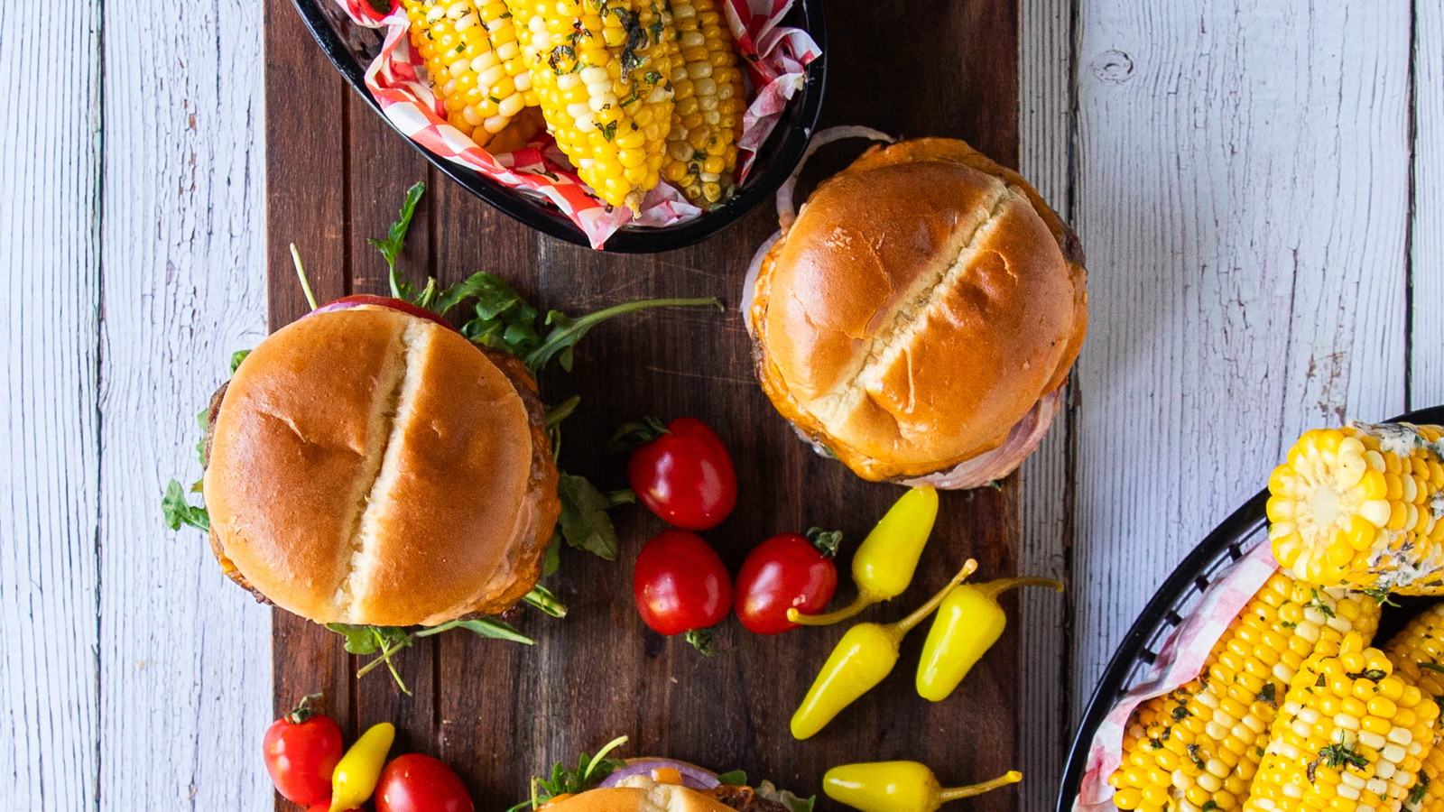 Image of Prime Rib Burgers with Herb Butter Corn on the Cob