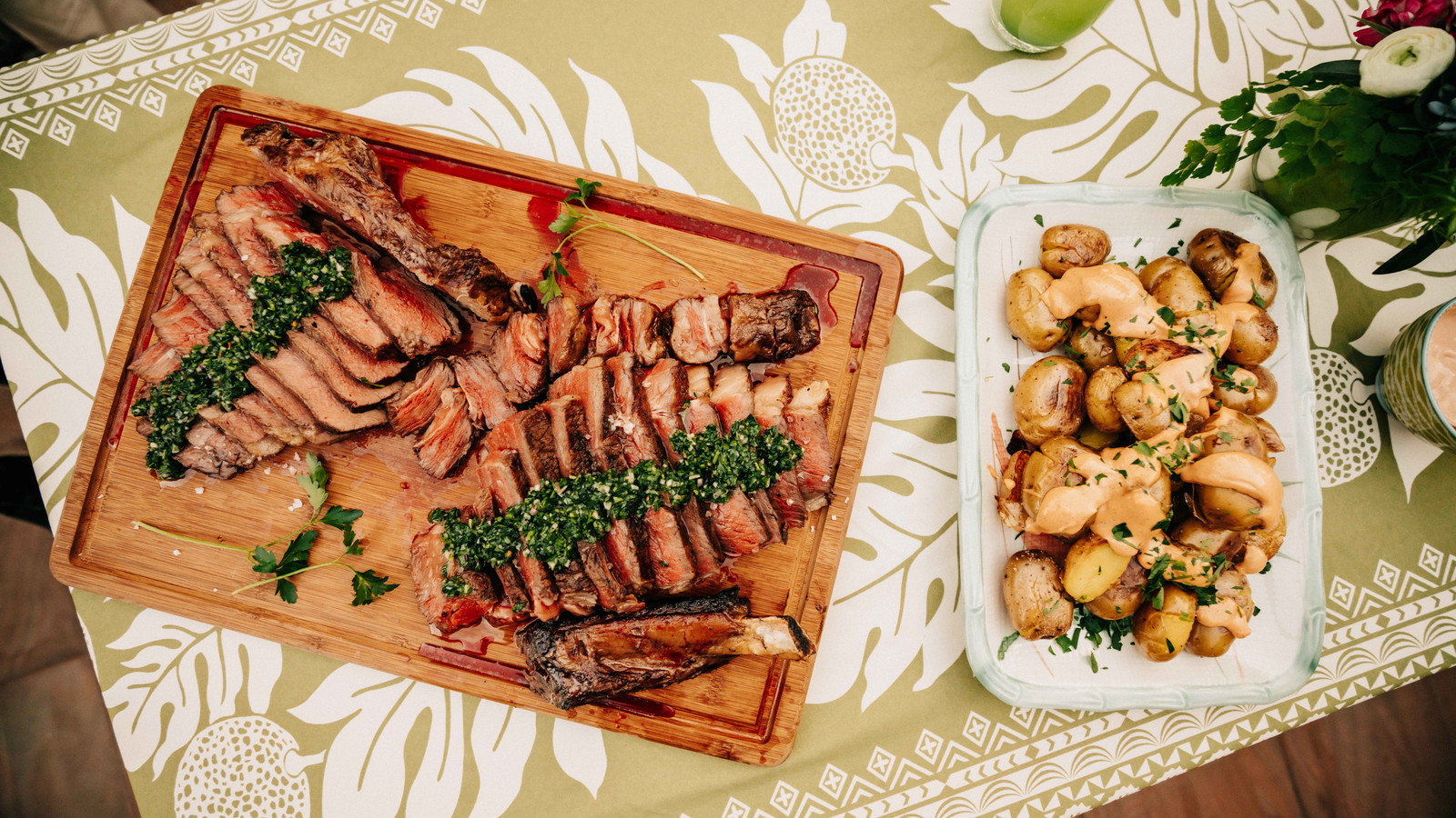 Cowboy steak sliced on cutting board 