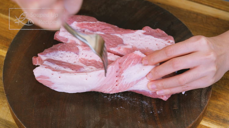 Image of Use a fork to poke lots of holes on the...