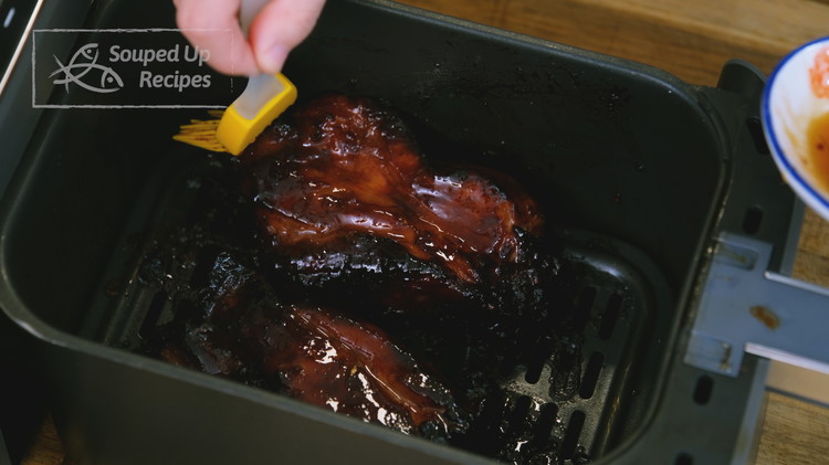Image of Pull the meat out of the air fryer one last time and brush it with honey again. Let it cook at 350F for another 2 minutes. Every air fryer is different. Feel free to pull it out and check the...