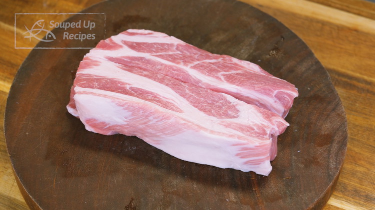 Image of Cut the pork into 1.5-inch thick strips and make sure the length fits into your air fryer basket. Recommend using pork butt, pork loin, or pork belly.