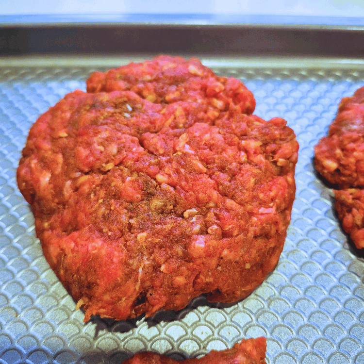 Image of Season the ground venison with the taco seasoning, salt and pepper and mix well. Form loose 2–3 oz balls of ground venison. Keep them loosely packed for better texture.