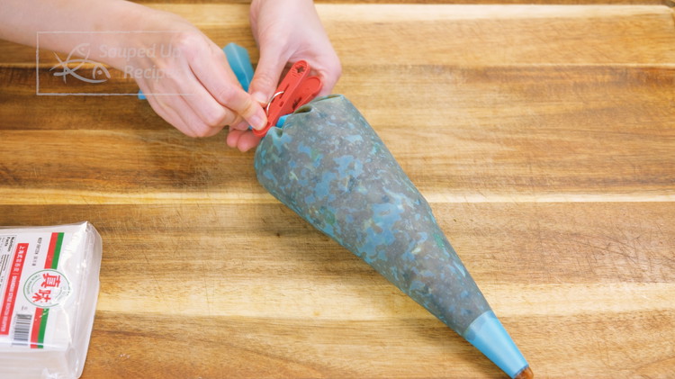 Image of Use your biggest piping tip and put it into a piping bag along with all the filling. Yes, you didn't hear me wrong. I have many piping bags for multiple purposes. I use it to make rice noodles, make casing-free...