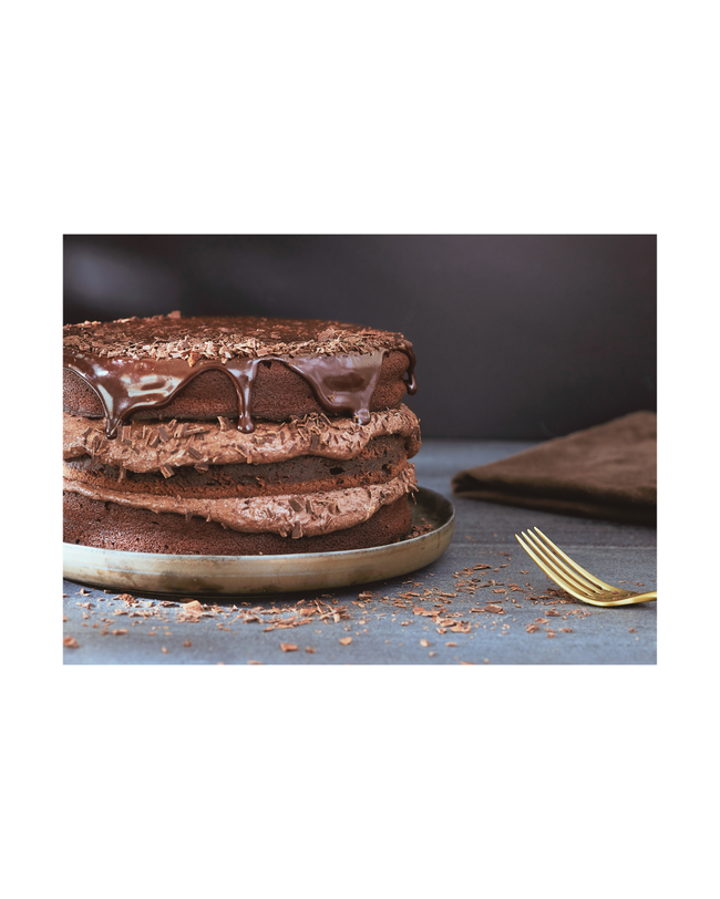 Three Layer Chocolate Paleo Cake with Avocado Mousse Filling and Paleo Chocolate Ganache and Chocolate Shavings