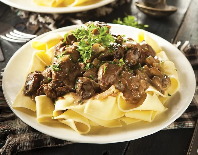 Image of Beef Stroganoff Over Buttered Noodles