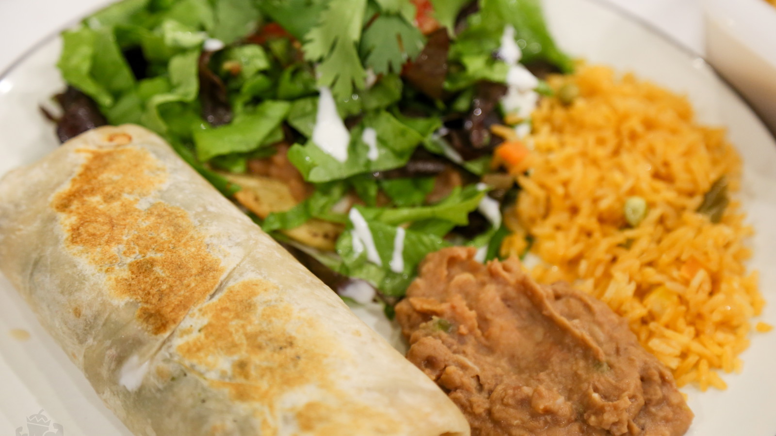 Image of Chili Relleno Stuffed Burrito with Crispy Pork Belly