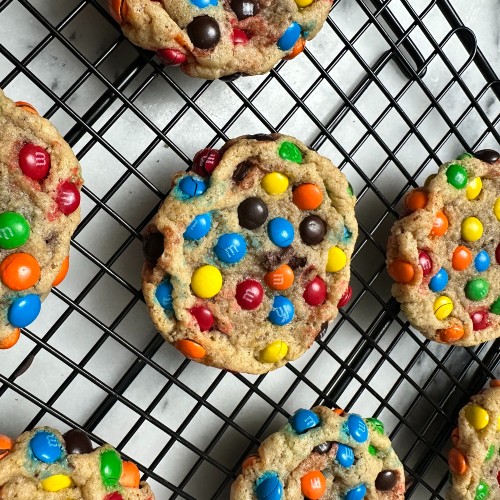 Chocolate Chunk Cookies rolled in Mini M&Ms. 