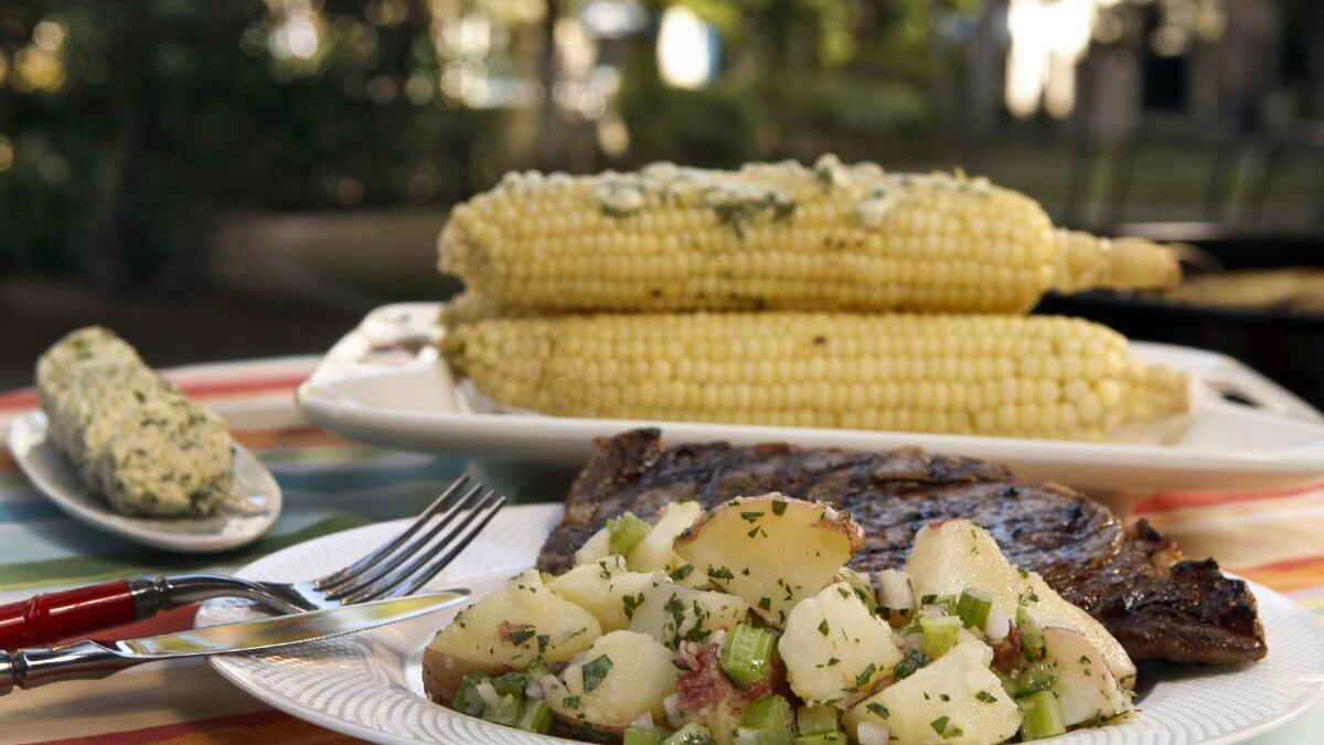 Image of Grilled Bone-In New York Steak & Classic Potato Salad