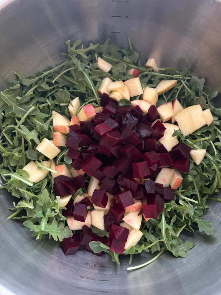 Image of Add 1 Cup of the chopped beets to the mixing bowl.