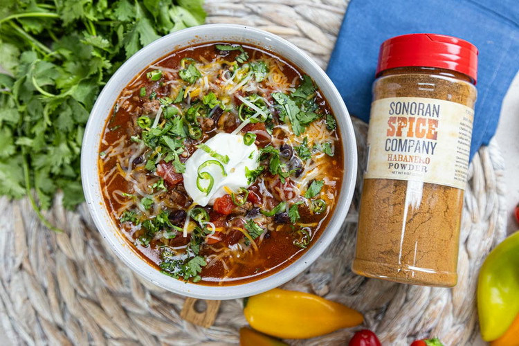 Image of Serve: Once the chili has thickened and the flavors are well-developed, serve hot with optional toppings like shredded cheese, sour cream, chopped green onions, or cornbread on the side.