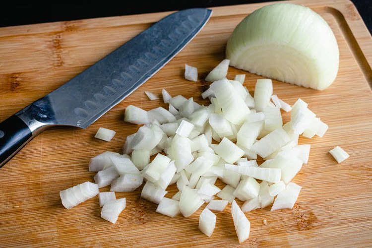 Image of Prepare Ingredients: Dice the large onion and mince the garlic cloves. Drain and rinse the black beans (or pinto beans) and kidney beans. Set aside the tomato sauce, diced tomatoes, and diced tomatoes with green chilis (Rotel).
