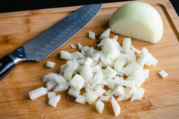 Image of Prepare Ingredients: Dice the large onion and mince the garlic...
