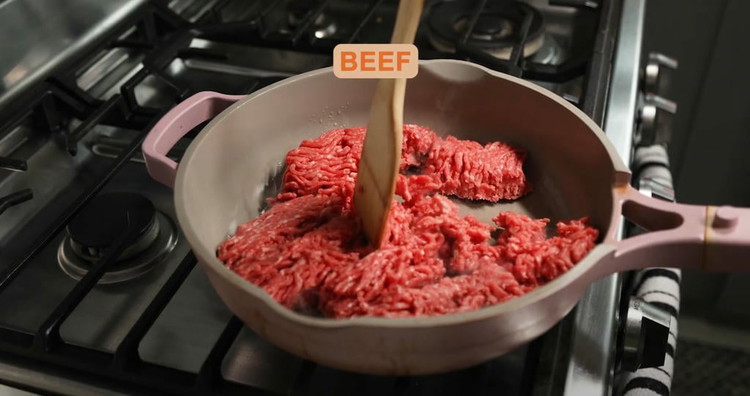 Image of Cook the Ground Beef: In a large skillet over medium-high heat, add the 2 lb ground beef (80/20). Break it apart with a wooden spoon and cook until browned, about 5-7 minutes, stirring occasionally. Drain excess fat if desired, but...