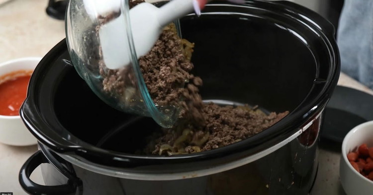 Image of Transfer to Slow Cooker: Transfer the beef, onion, and spice mixture to a slow cooker. Add the drained and rinsed black beans (or pinto) and kidney beans, followed by the 30 oz tomato sauce, 30 oz diced tomatoes with juice,...