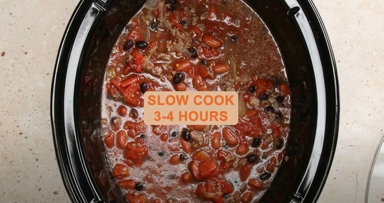Image of Simmer the Chili: Cover the slow cooker and cook on...