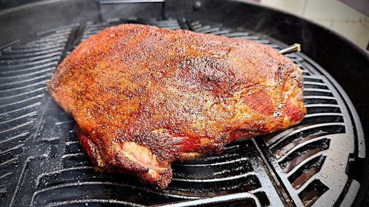 Image of Cook lamb until bark has started to form, meat has darkened and should becoming red if smoking. This typically takes 4-6 hours and internal temp is approx 70C/160F 