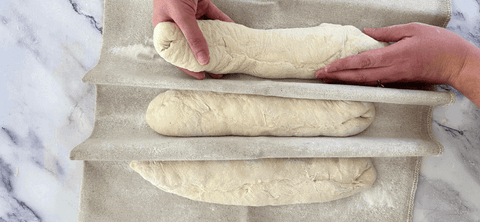 Image of Place shaped baguettes seam side down.