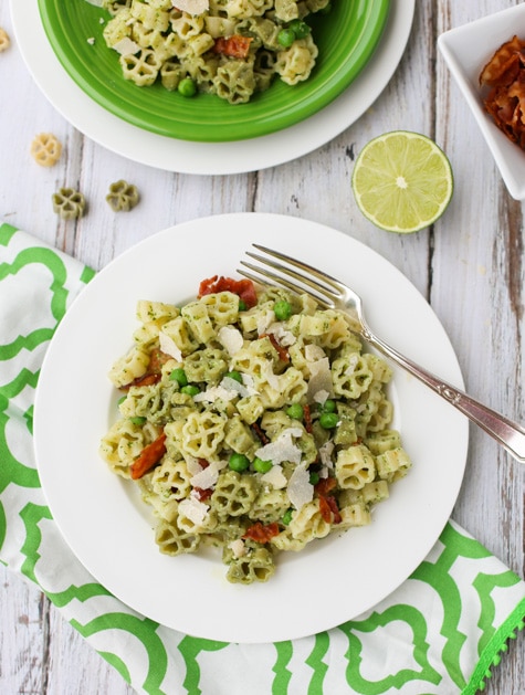 Arugula and Lime Pesto Pasta | A tangy and delicious combo for pesto! Add bacon, green peas, and make it your own! Yum! | WorldofPastabilities.com