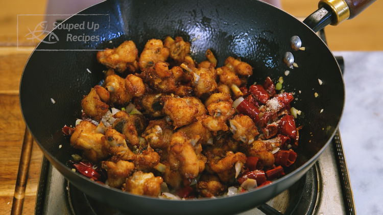 Image of Add the chicken back into the wok along with 1/2...