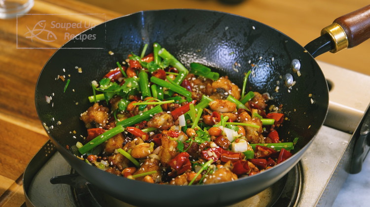Image of Last, add the crispy peanuts, scallions, cilantro, and toasted sesame seeds. Toss thoroughly, and serve with white rice or as a beer snack.