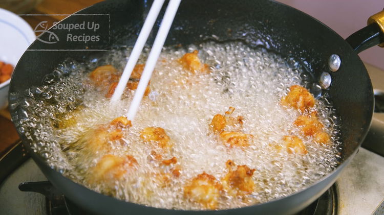 Image of Increase the oil's temperature to 380 F and add the...