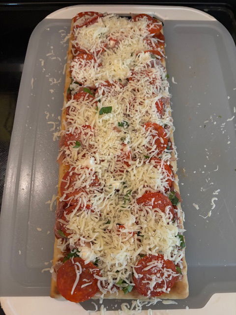 Image of Sprinkle the Italian Seasoning over the cheese.