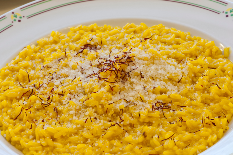 Image of Stir in saffron stock, butter, and parmesan. Rest 2 mins...