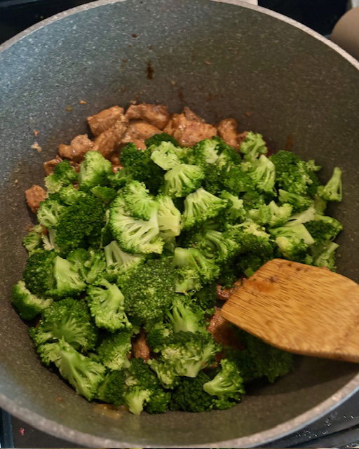 Image of Remove from heat and add the blanched broccoli to the...