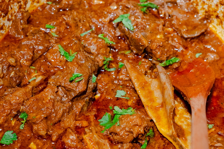 Image of Add water cover and cook for 1 hour and then uncover and simmer on low for another hour adding water if it gets too dry. You want a nice thick sauce at the end. You want the lamb to be...