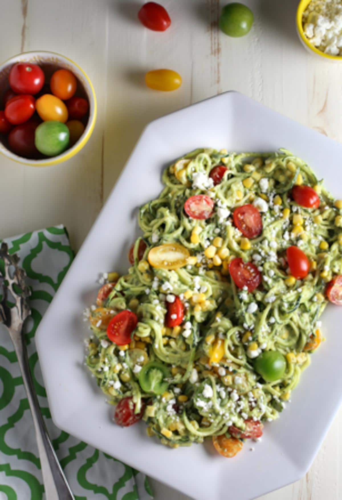 Zucchini Noodle Salad with Tomatoes, Goat Cheese, Corn and Avocado Sauce
