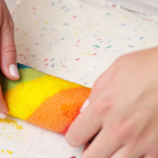 Image of Von der kurzen Seite her aufrollen.