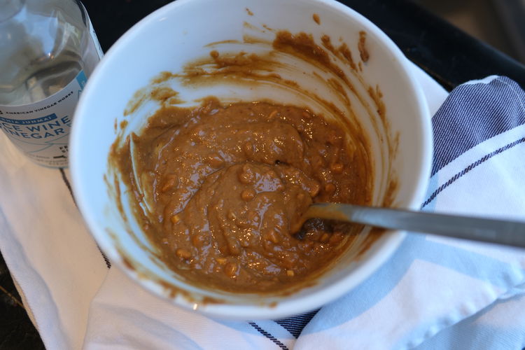 Image of Whisk with a fork all the ingredients, other than water,...