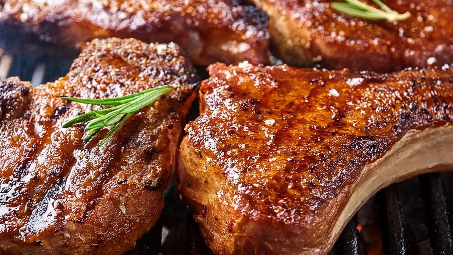Pork chops on grill, crispy, mother lode seasoning on chops