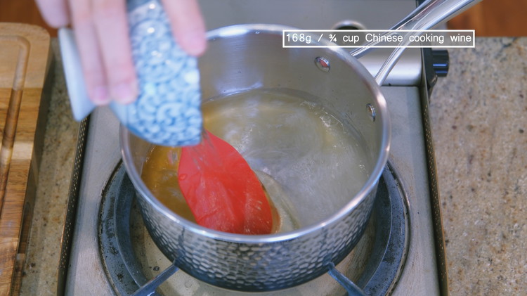 Image of In a saucepan, add the sugar, maltose, vinegar, and Chinese cooking wine. Stir everything over medium heat until fully dissolved. Set it aside. This glaze will caramelize while roasting, giving the duck that desired reddish-brown color. 