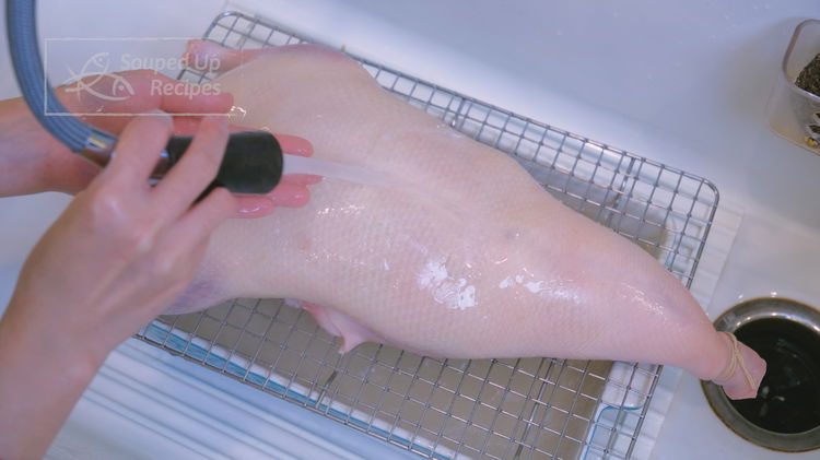 Image of Rinse the duck under running water to prevent it from...