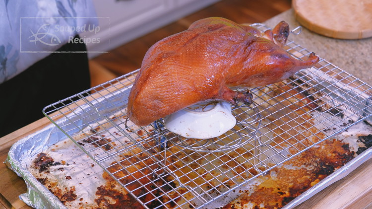 Image of Change the oven temperature to 320°F / 160°C, open the oven door for a few seconds to release some heat, and continue to bake for 50 minutes for a 4-pound duck. Add 15 more minutes for every extra pound. Every...