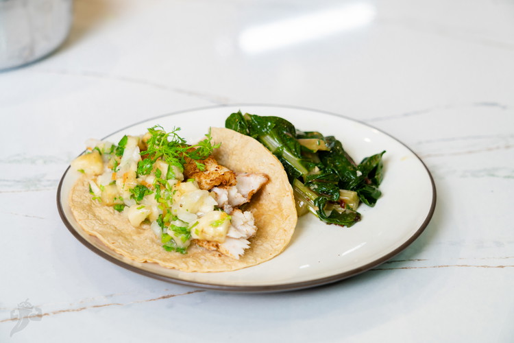 Image of Assemble your tacos. Corn tortillia, Fish, Banana Salsa on top. Enjoy!