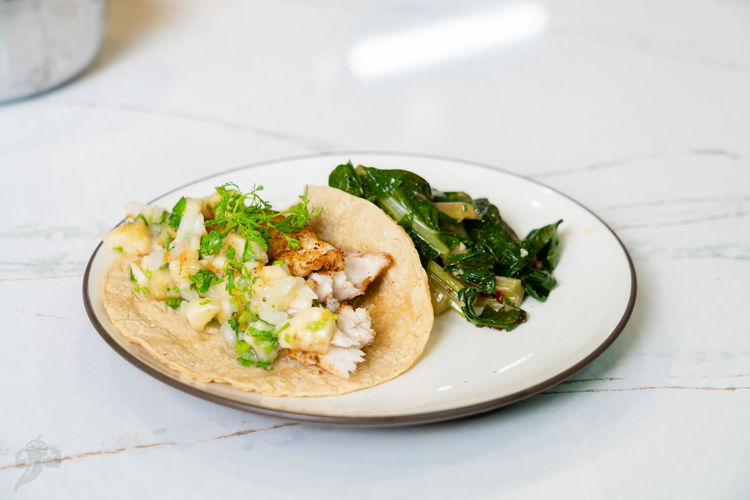 Image of Assemble your tacos. Corn tortillia, Fish, Banana Salsa on top....