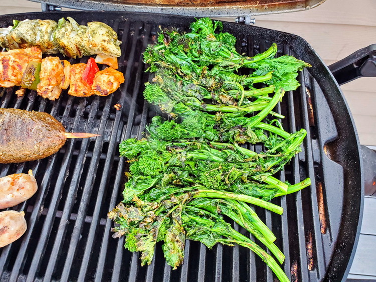 Image of Grill broccoli rabe until it is well wilted and has a slight edge char on a few edges.  Exact time depends on your grill but I would think 5 to 8 minute range.  Be mindful to turn the broccoli rabe...